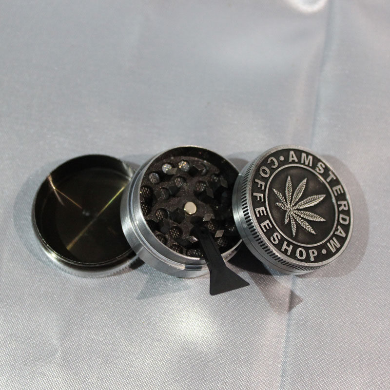 immagine di grinder Amsterdam nero metallo 3 parti