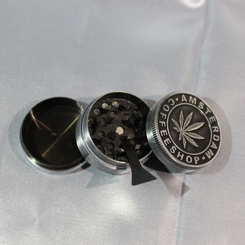 Grinder metal Amsterdam 1 immagine di grinder Amsterdam nero metallo 3 parti